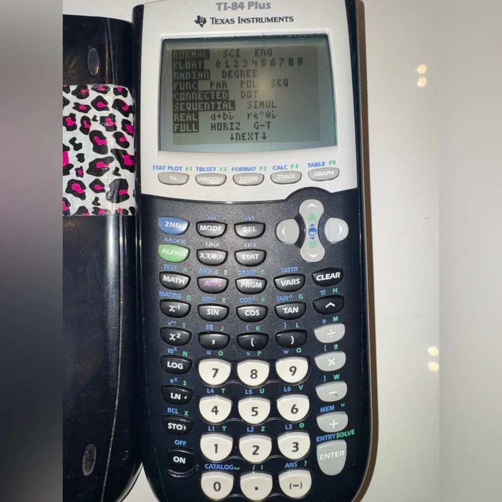 🛍️Texas Instruments TI-84 Plus Graphing Calculator - Black and Silver - Picture 9 of 13